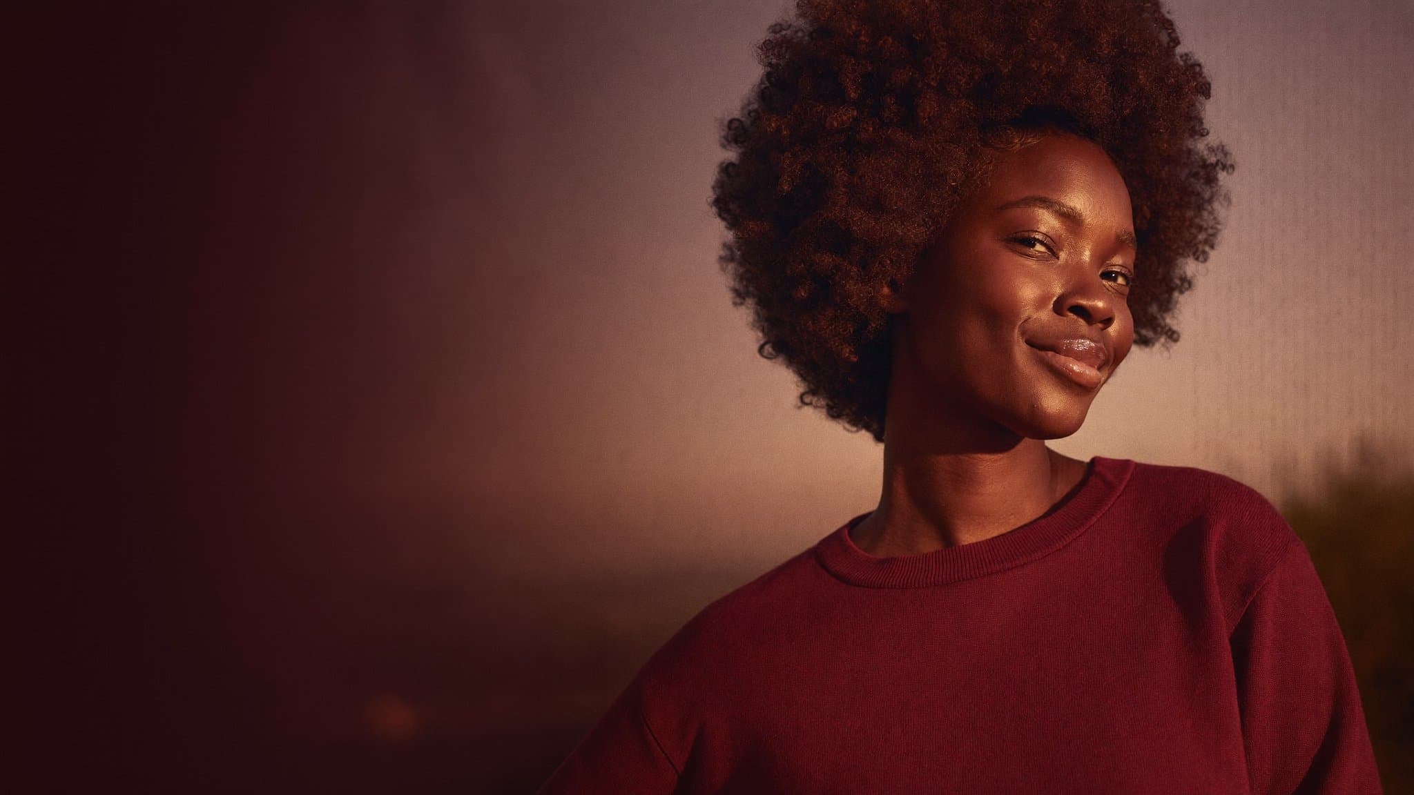 A confident South African woman, part of the Glow Creatine story